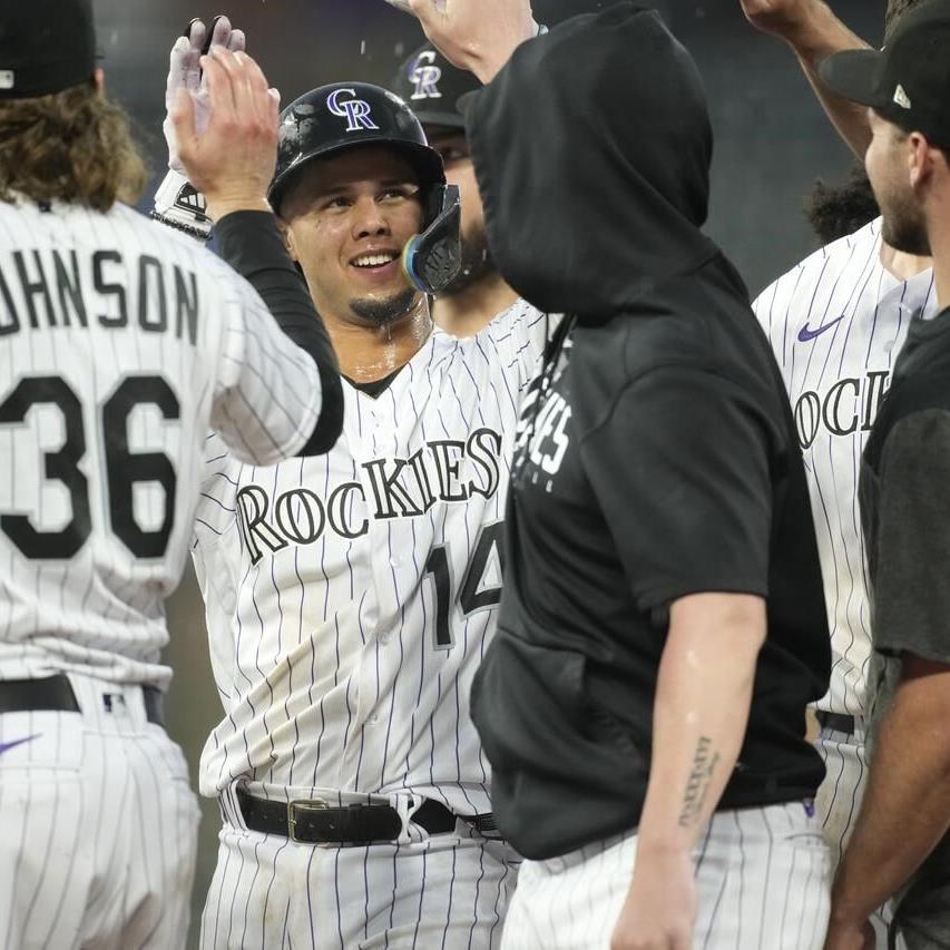 Tovar's single in storm lifts Rockies over Marlins 7-6 after blown 4-run  lead - Sentinel Colorado