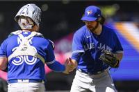 Blue Jays hang on to beat Mariners as closer Jordan Romano escapes