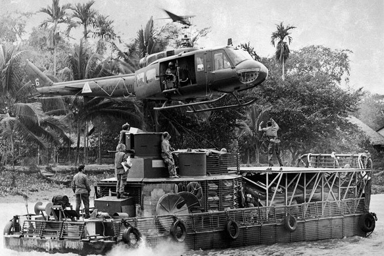 Vietnam veteran Larry Dandridge 2 helicopter lands on boat.jpg