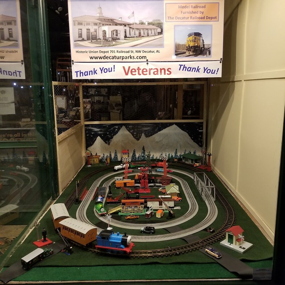 big model trains running in and out of my house