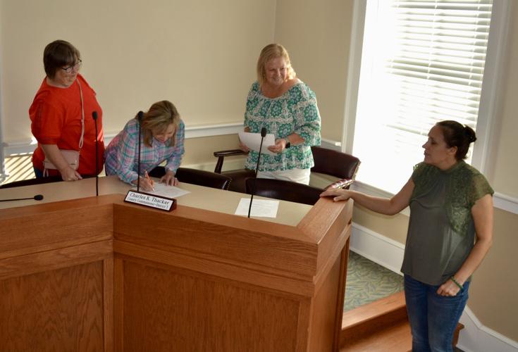 Three newly elected school board members sworn in, main swearing in