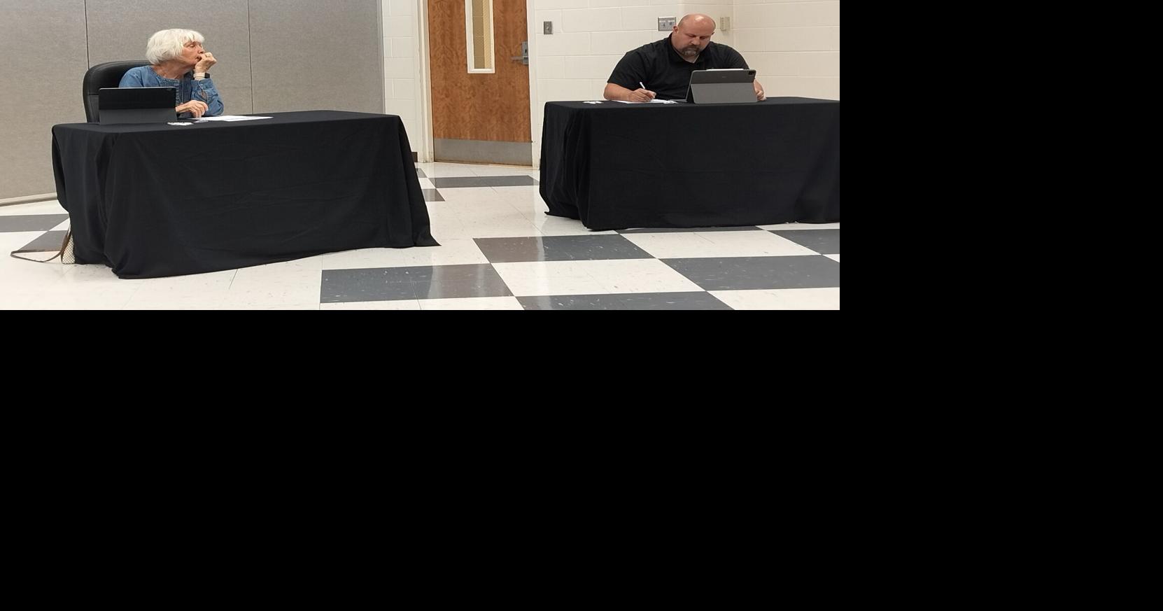 RCS board rehires teachers in brisk meeting