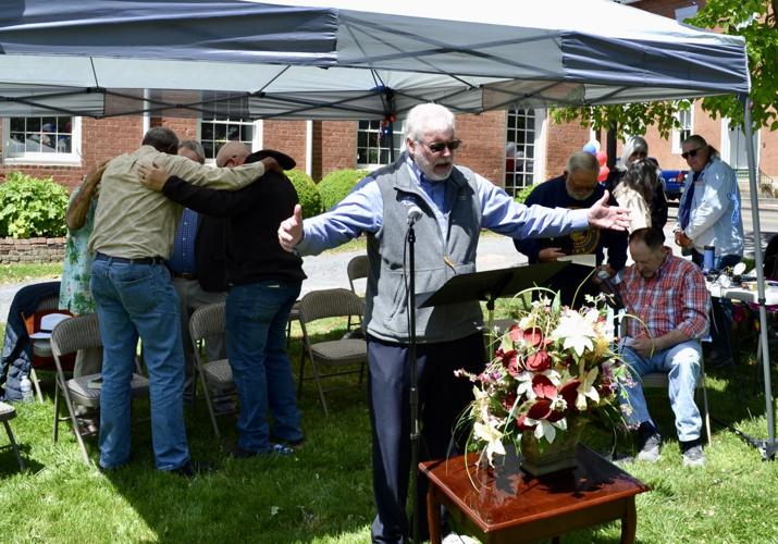 Rev. John Butler Rogersville residents, clergy meet at Courthouse Square for National ...