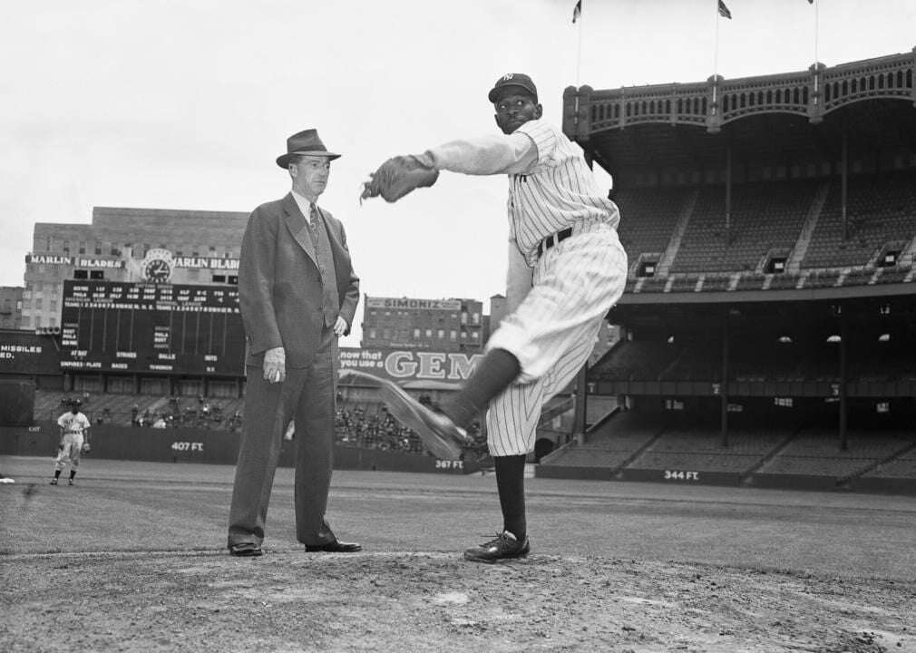 Satchel Paige Pitching For Kansas City by Bettmann