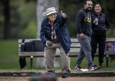 Clifford Jacobson gave a thumbs up before rolling his ball down the court in the Northeast Bocce League play at Beltrami Park.