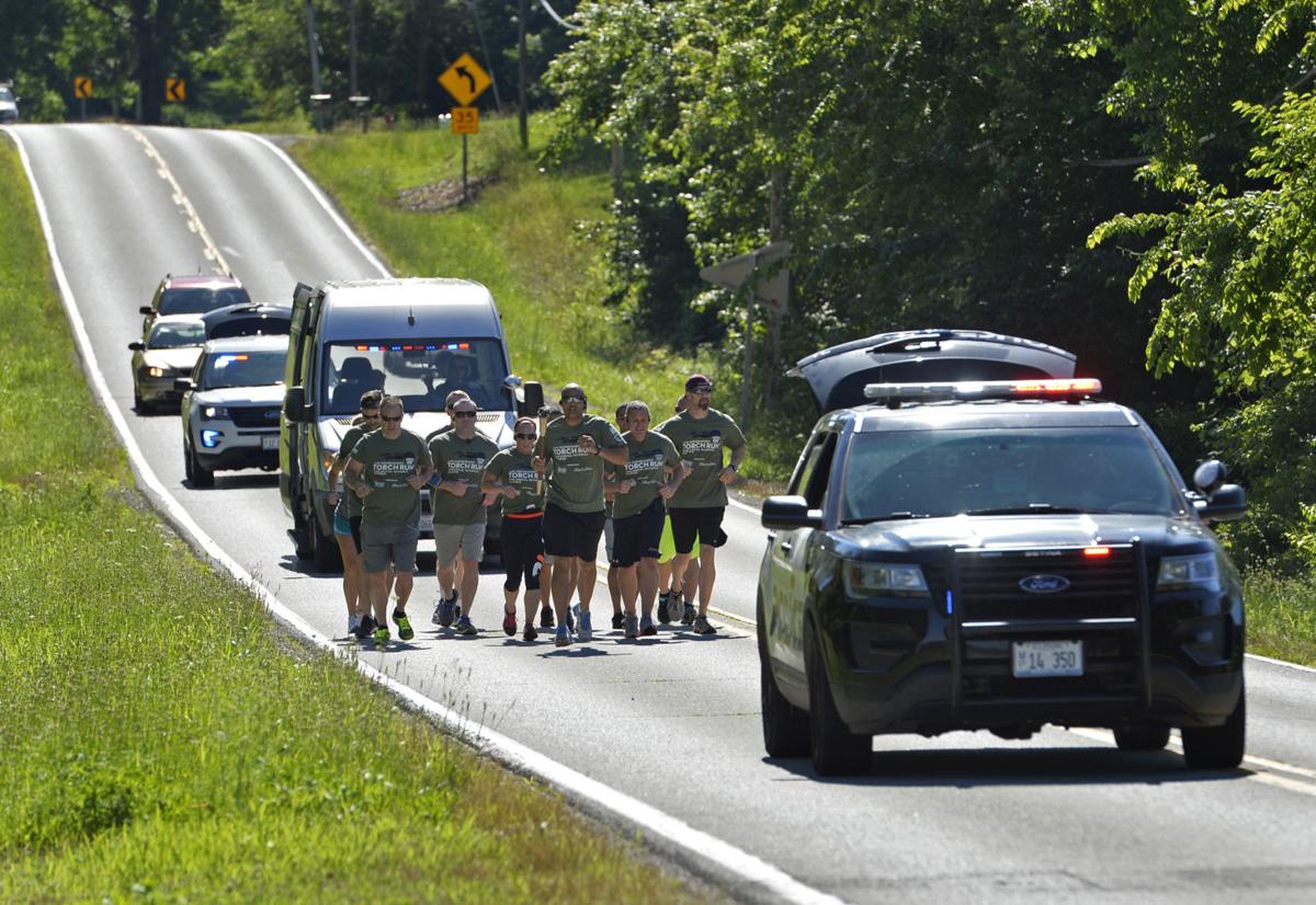 Local police officers carry torch for Special Olympics Illinois