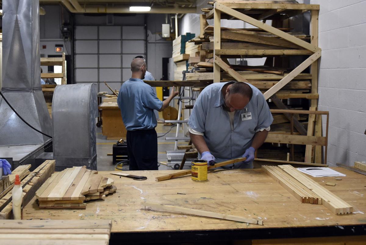 Offenders at Shawnee Correctional build doghouses, playhouses to