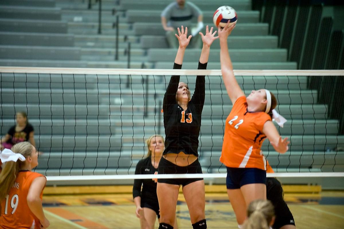 Photos Action from Carterville vs Herrin volleyball