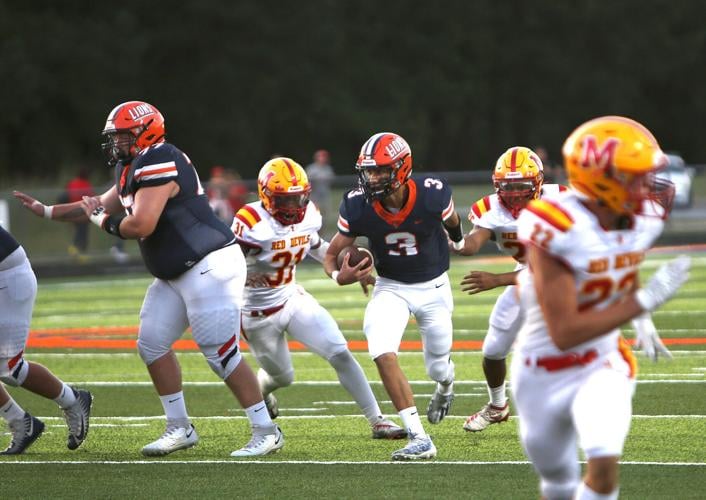 Prep Football Offensive fire power leads Carterville to a huge win