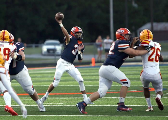 Prep Football Offensive fire power leads Carterville to a huge win
