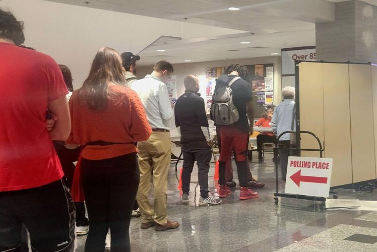 Poll Line Early voting underway: What drives people to the polls before Tuesday ...