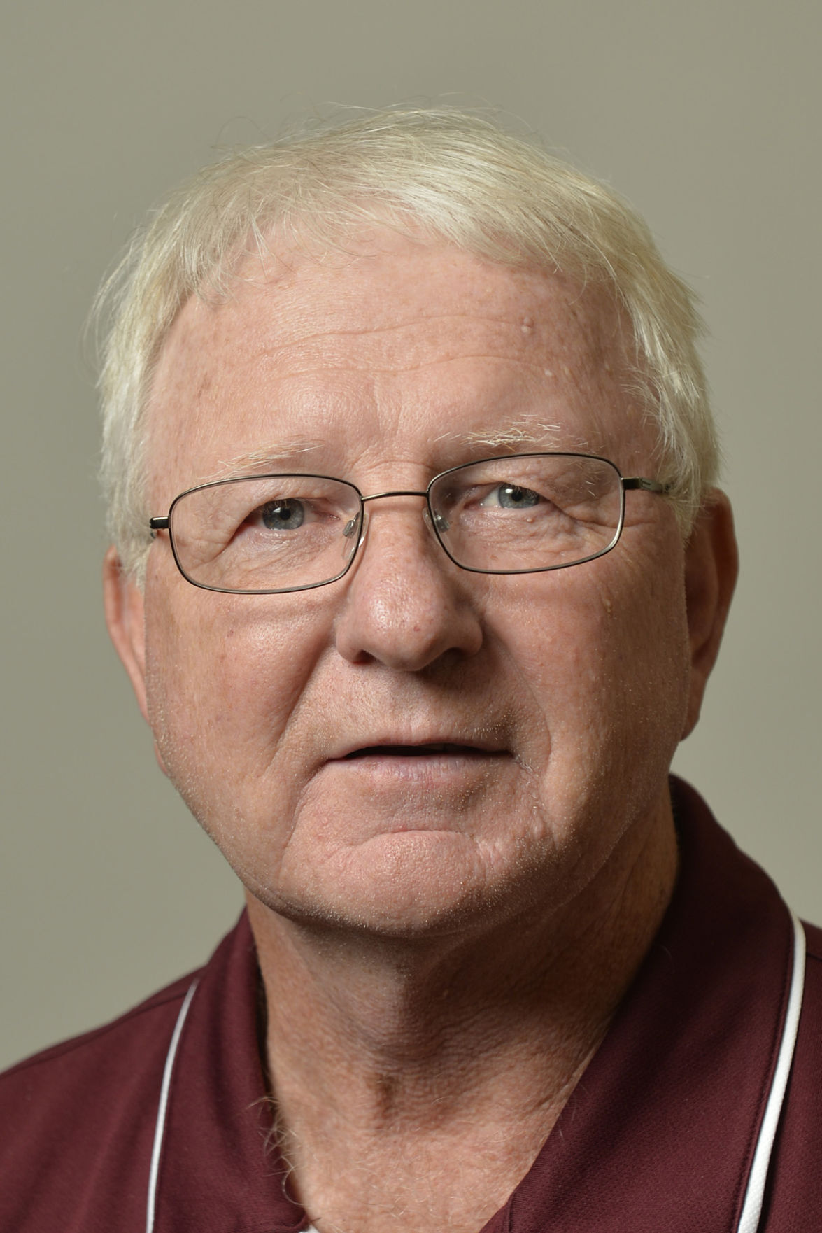 Column  Benton's McLain back to coach after heart surgery