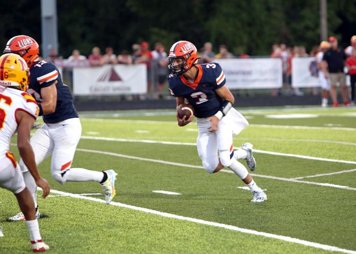 Prep Football Offensive fire power leads Carterville to a huge win