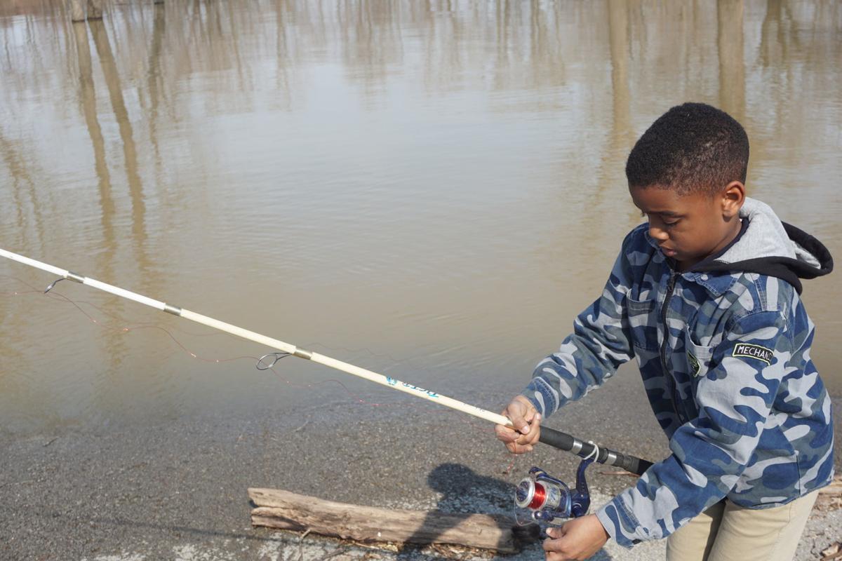 Catch of the day Cairo residents fish the Ohio River floodwaters