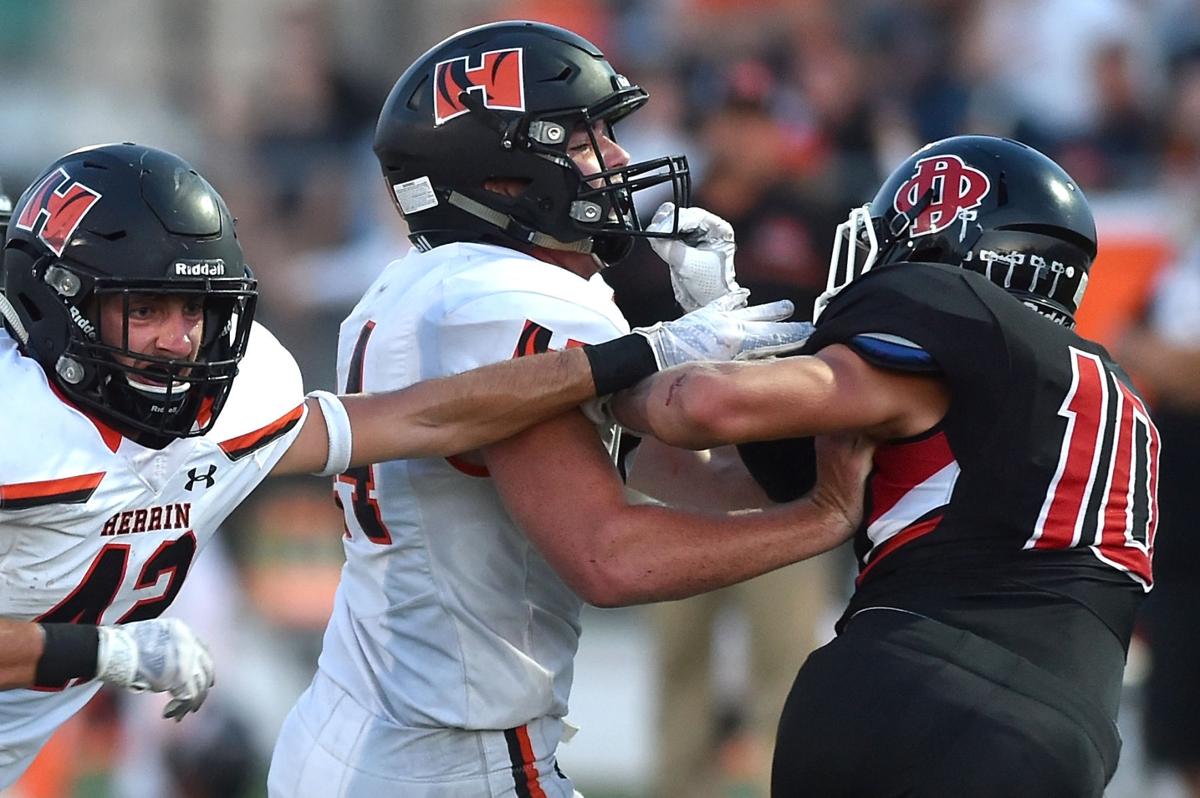 Prep football: Du Quoin defeats Herrin