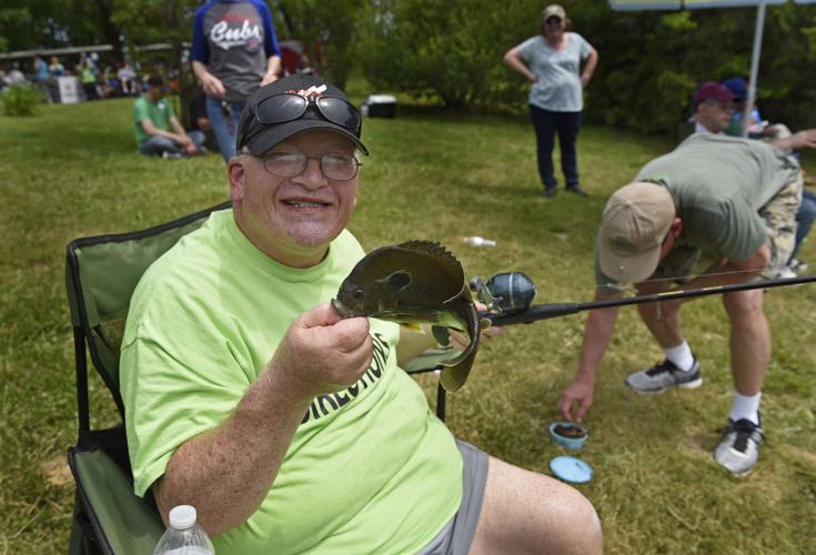 Hooked Annual fishing expedition for special populations draws 1,400