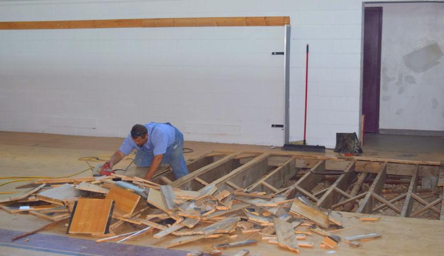 Gym, roof construction begins at Cobden High School Education