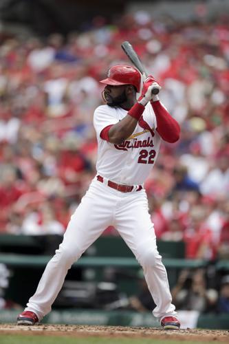 On fire Cardinals take down Cubs to increase their lead in NL Central