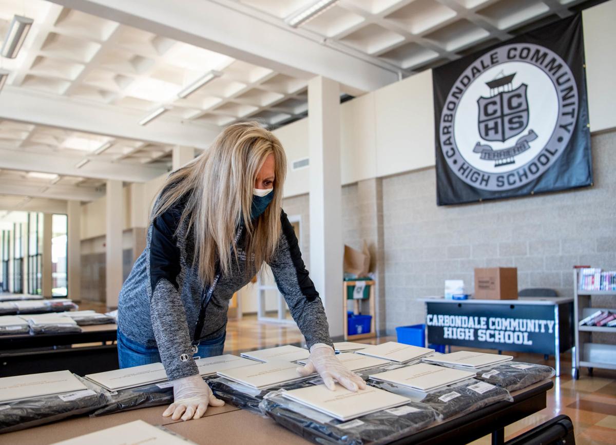 Photos Cchs Seniors Pick Up Caps And Gowns For Graduation Amid Covid 19 Pandemic Education Thesouthern Com