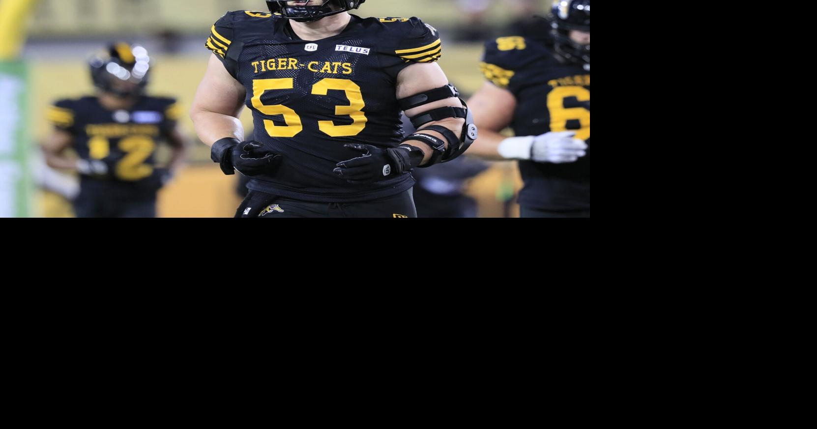 One offensive lineman; Two master’s degrees