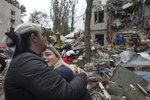 Photos of the latest Russian drone and missile attack in Kyiv