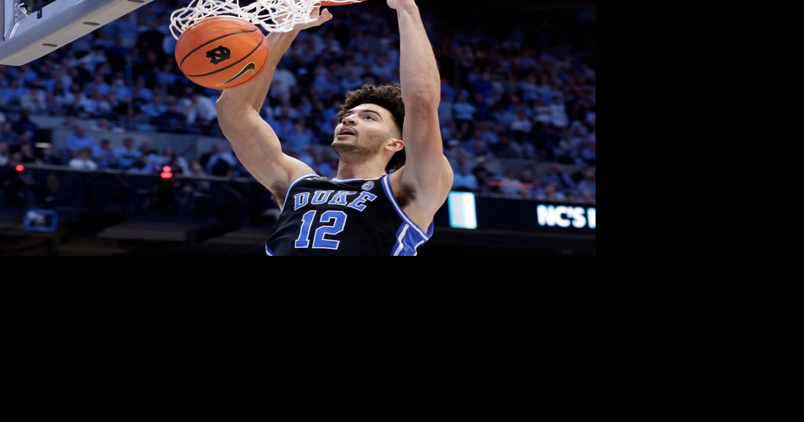 Cameron Boozer sparks Duke’s late surge to topple top-ranked Michigan 68-63
