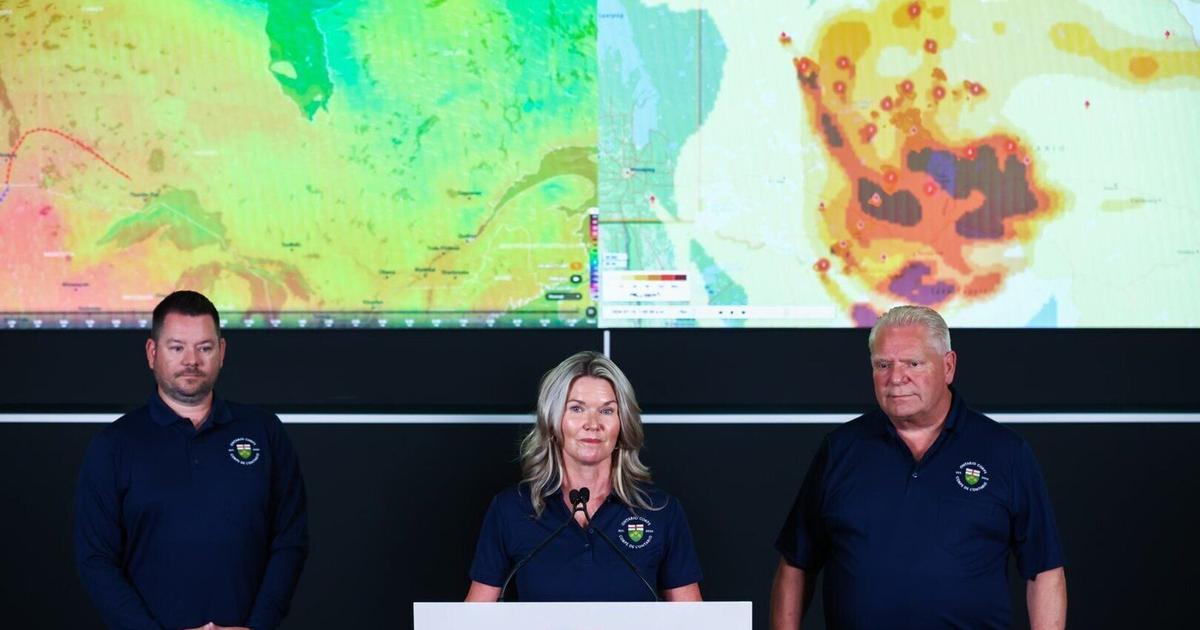 Kathryn Mannie The Canadian Press reporting image