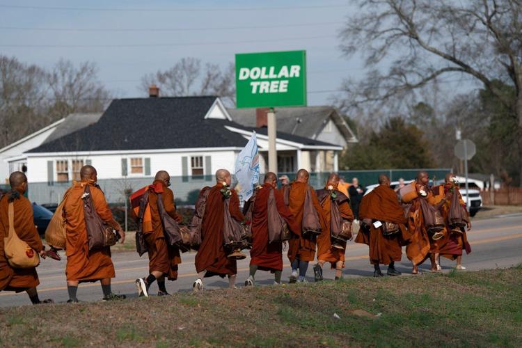 Monks Rescued Dog Photos of monks and rescue dog as they finish cross-country peace walk ...