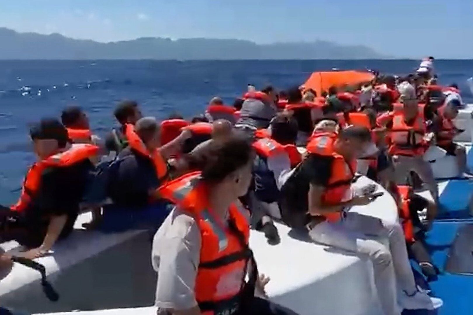 Survivors of Cypriot ferry disaster that killed eight describe terror and panic as ship sank off coast; investigation launched, crew held