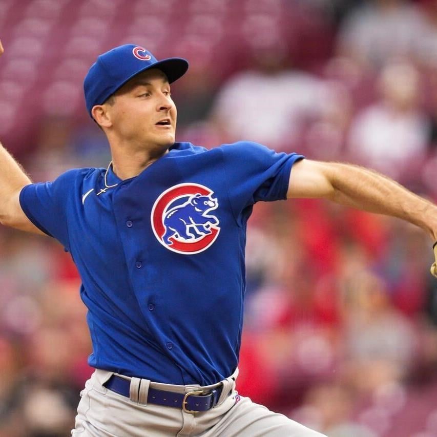 Wisdom's 3 hits, 6-run seventh, power Cubs over Reds 12-5