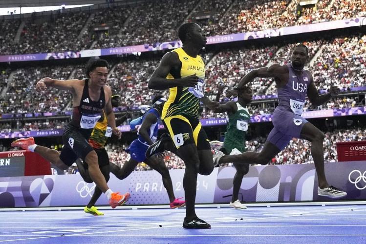 Noah Lyles wins a historically close Olympic 100meter sprint by five