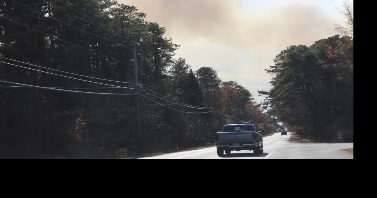 Fire crews on both US coasts battle wildfires