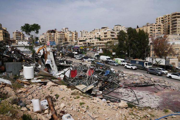 Israeli bulldozers raze about 50 Palestinian shops ahead of settlement ...