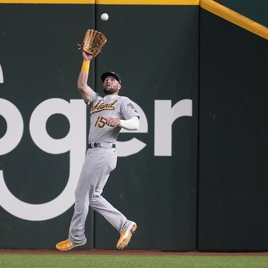 Rangers score go-ahead run on wild pitch to beat A's 3-2