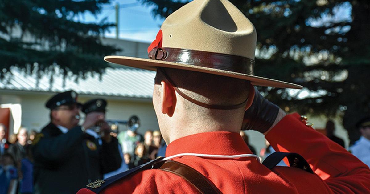 Rcmp Vip Course RCMP officers stand with veterans for Remembrance Day