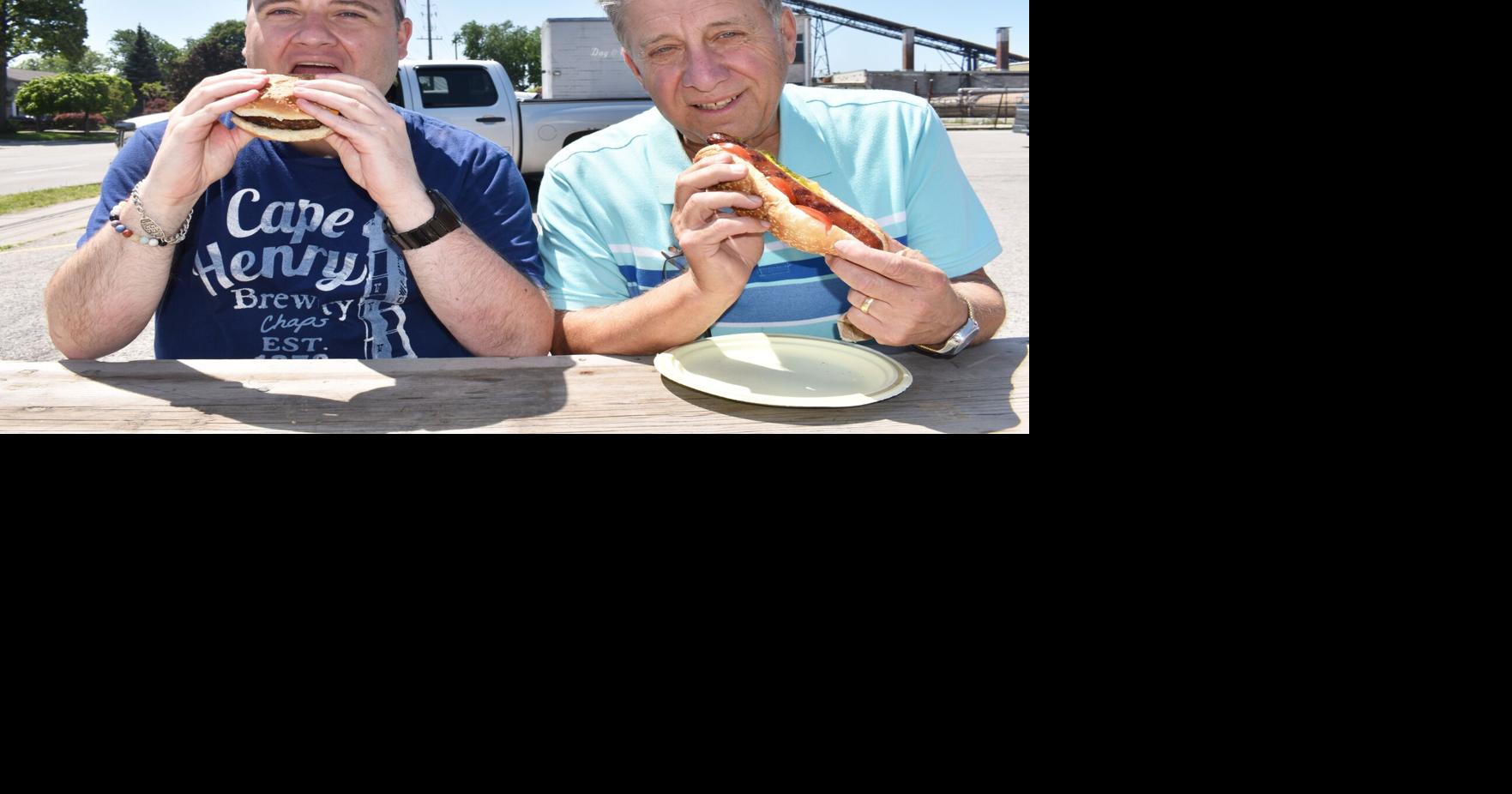 Dr. Bob Kemp Hospice volunteers grilling for a good cause