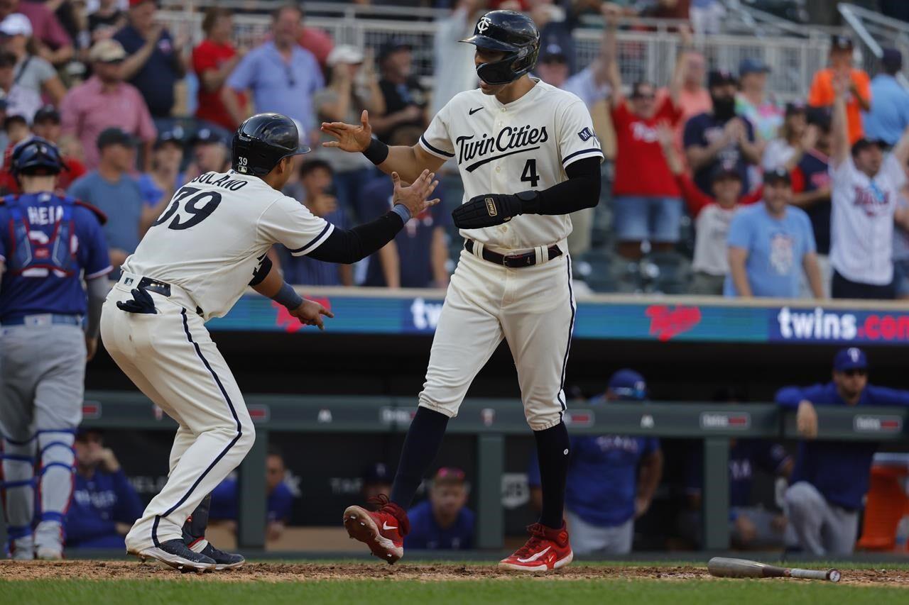 Twins rout Rangers 12-2