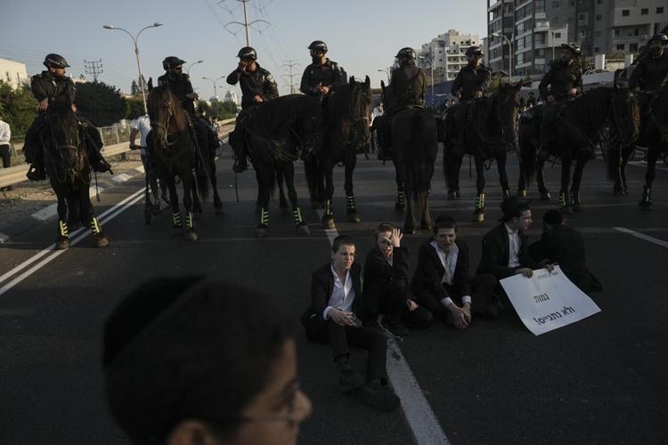 Jewish Block Ultra-Orthodox Jews block highway to protest Israel's new mandatory ...