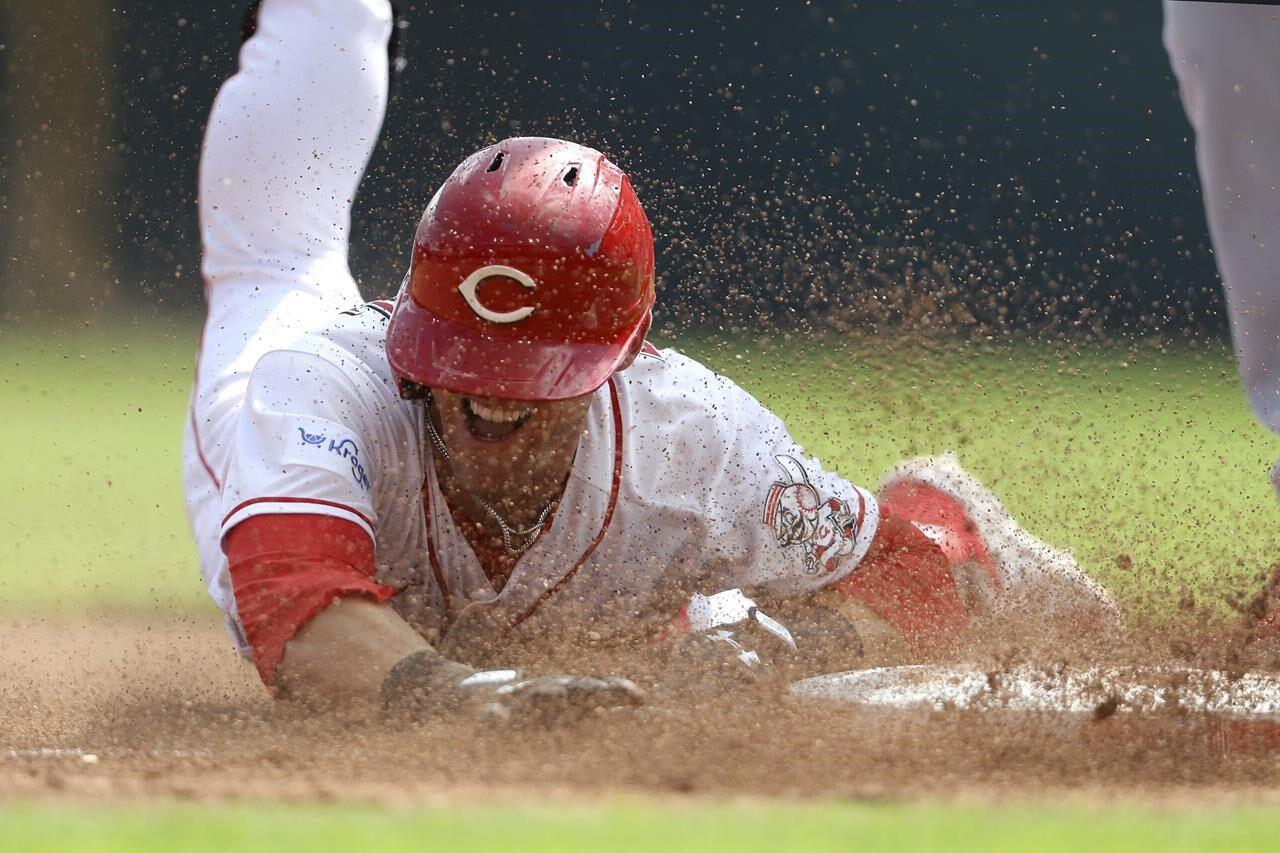Wainwright strikes out in cameo to end career as Cardinals beat Reds 4-3.  Votto ejected
