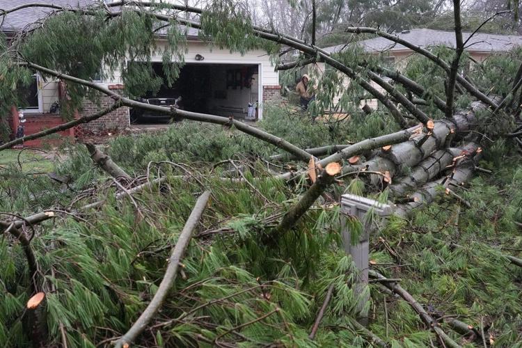 Photos show tornado damage after powerful storms hit Illinois and Indiana