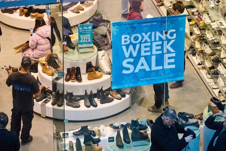 Boxing Day draws shoppers despite poor weather in Toronto, much of Ontario