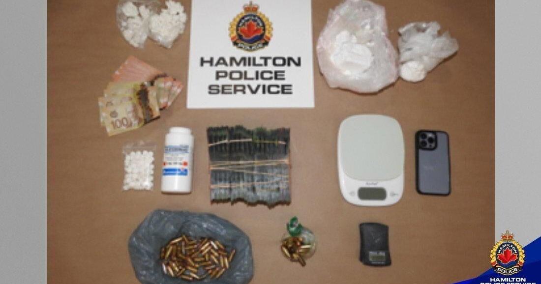 Loaded guns and $30,000 in drugs seized by Hamilton police