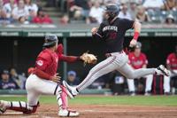 Royce Lewis hits a grand slam, drives in 6 as the AL Central-leading Twins  crush Cleveland 20-6