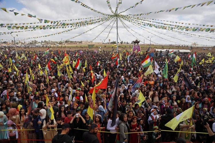 Kurds in Iraq and Syria celebrate the Newroz festival of spring at a ...