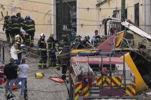 Famed streetcar in Portugal's capital derails and crashes, killing 15 people