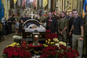 Hundreds mourn pro-Western Ukrainian politician who was gunned down in the street