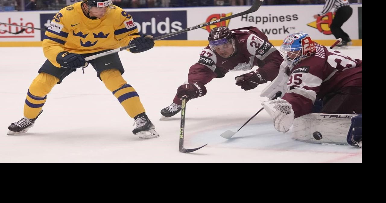 Sweden beats Latvia 7-2, Switzerland routs Denmark 8-0 at men’s hockey world championship