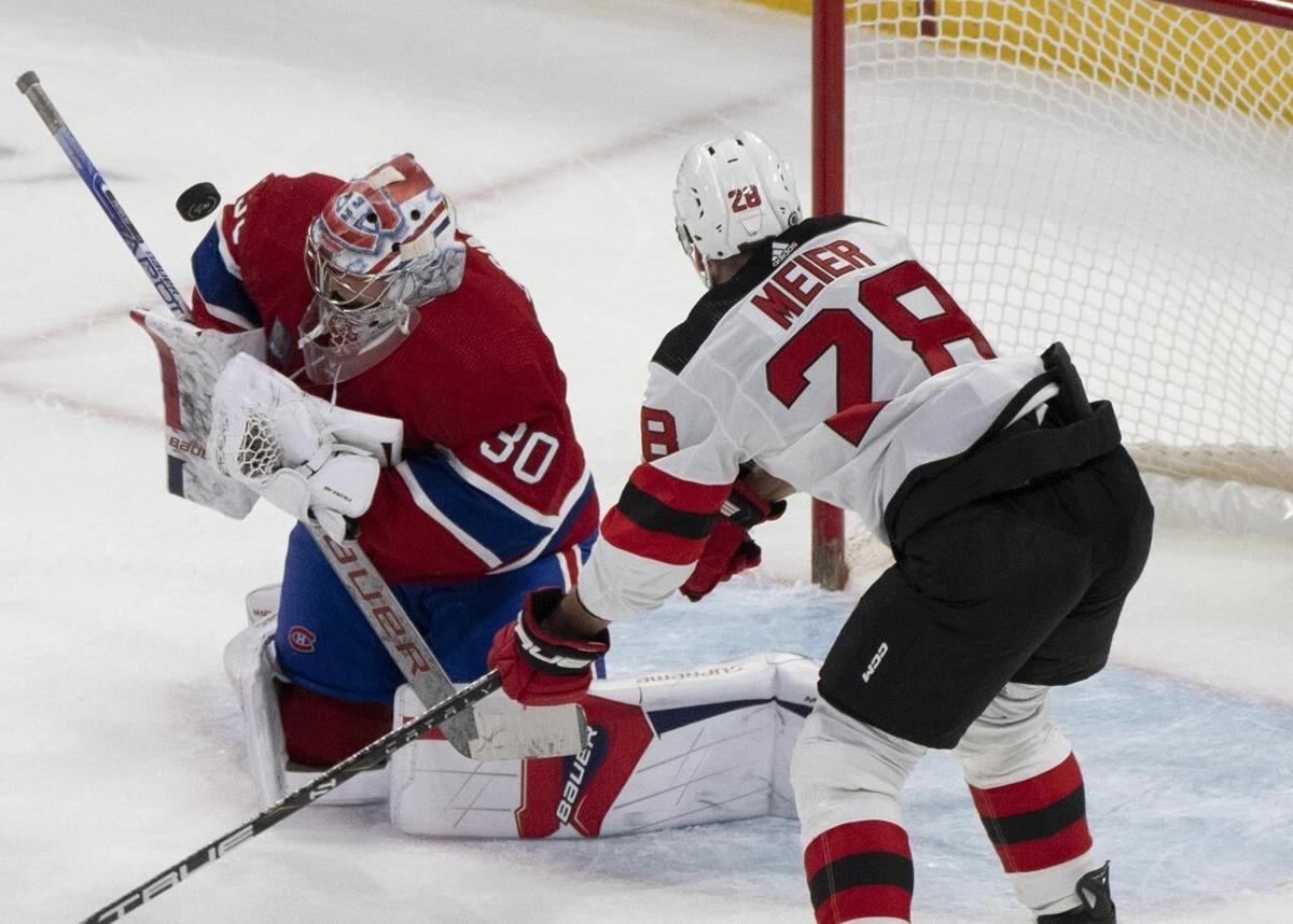 Hughes scores twice, Devils beat Canadiens 3-2 in shootout