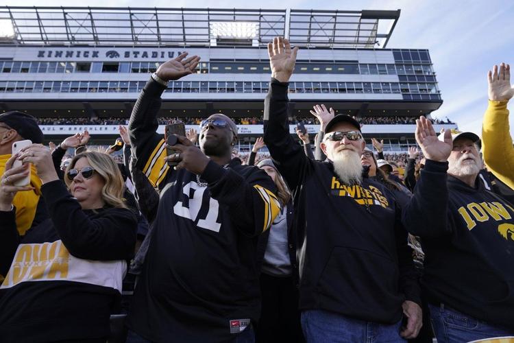 College football traditions: 'Hawkeye Wave' bonds everyone in stadium ...