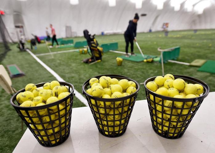 Indoor driving range helps Hamilton golfers stay active over the winter